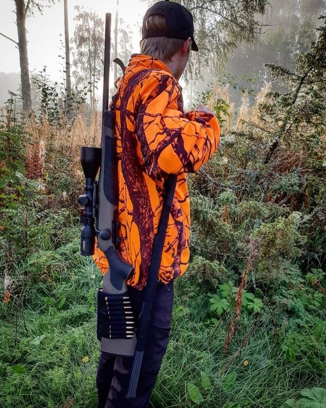 Skjutstöd och vapenrem i ett